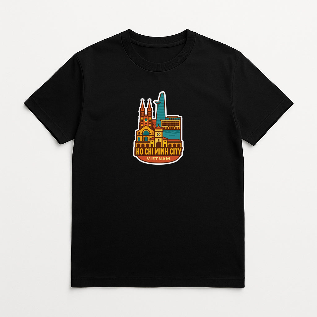 A black t-shirt with a colorful graphic design depicting a city skyline, including a tall tower and other buildings.