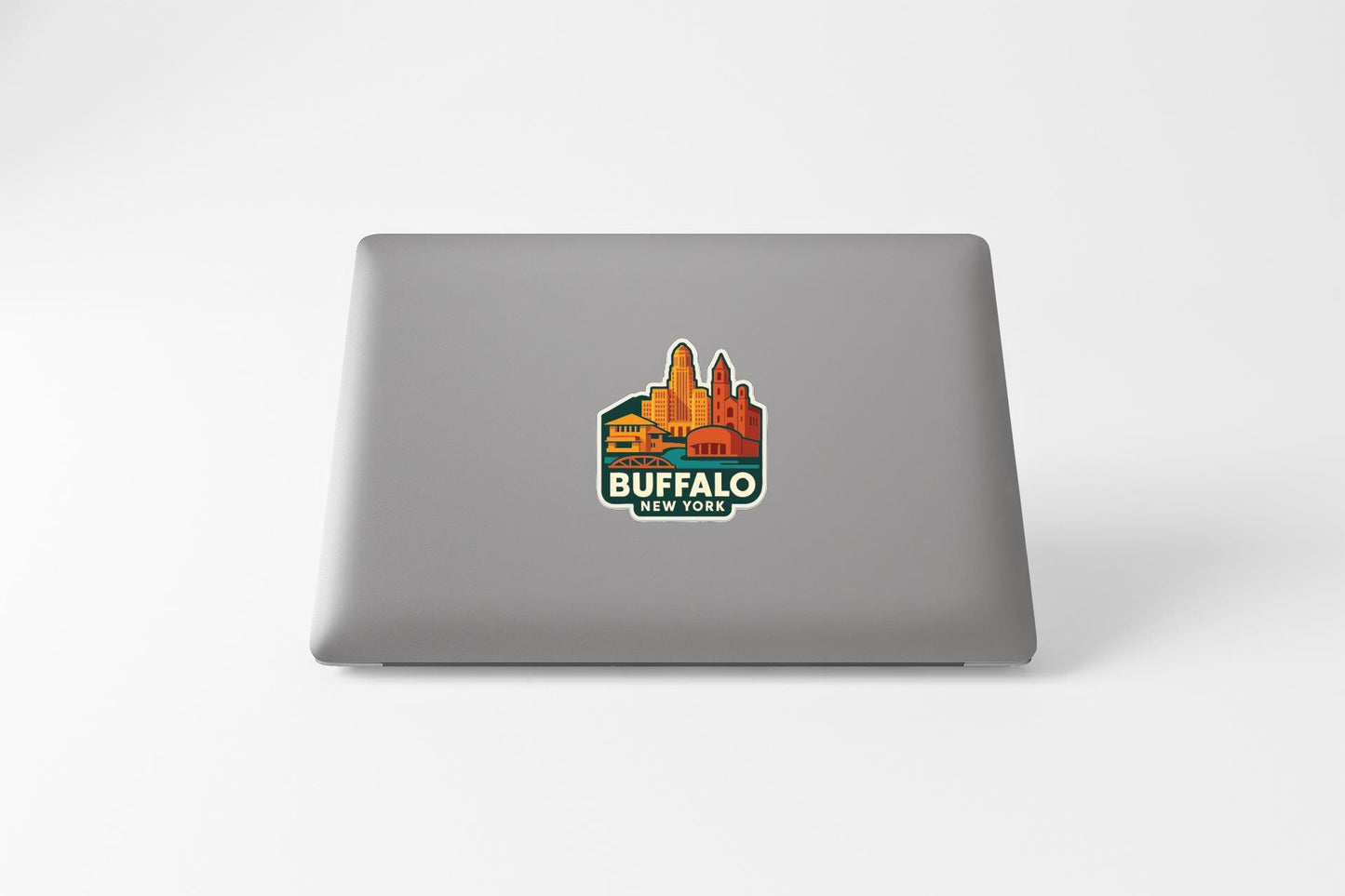 a sticker of Buffalo, New York, on the back of a laptop computer.