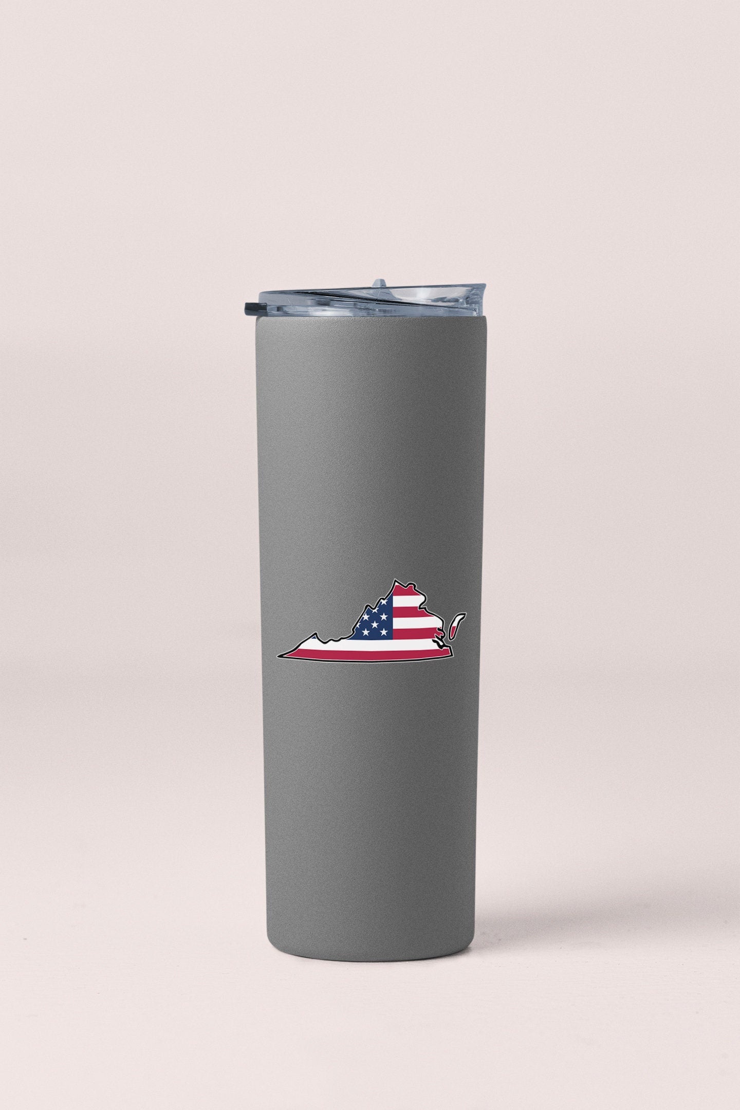 a gray tumbler cup with a picture of a boat on it