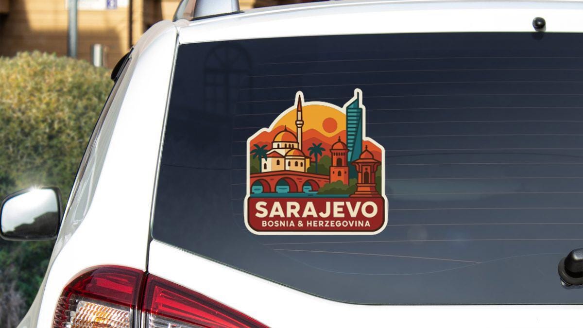 A sticker on the rear window of a car, depicting the skyline of Sarajevo, Bosnia and Herzegovina.