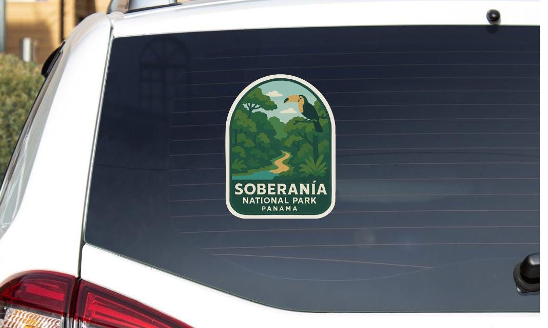 a sticker on the rear window of a car that says "Soberánía NATIONAL PARK PANAMA".