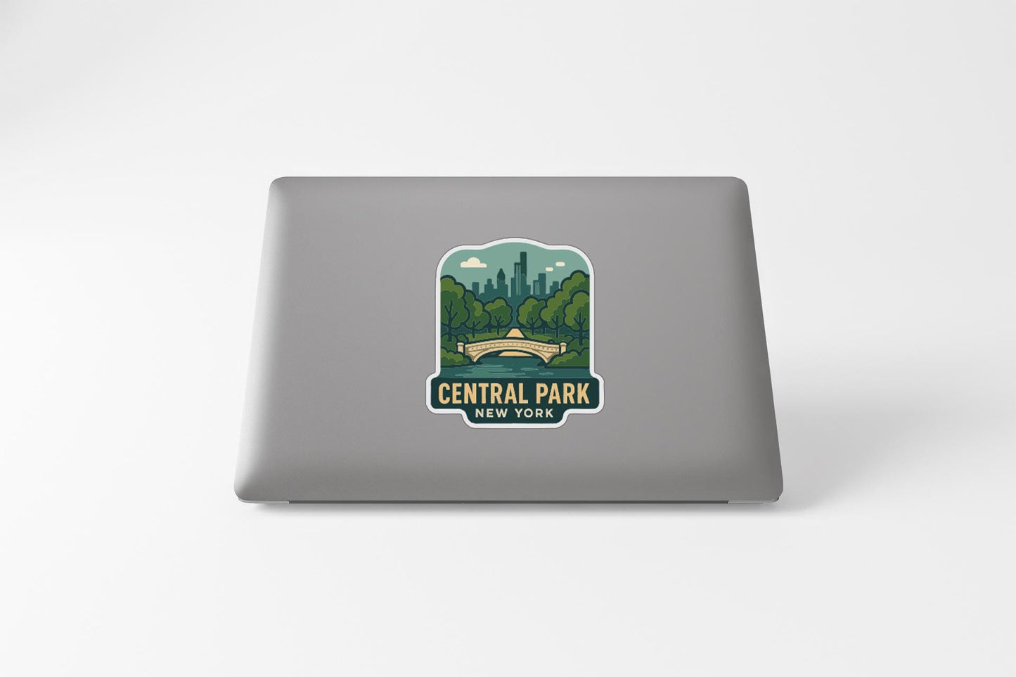 a sticker or decal of Central Park, New York, on the back of a laptop computer.