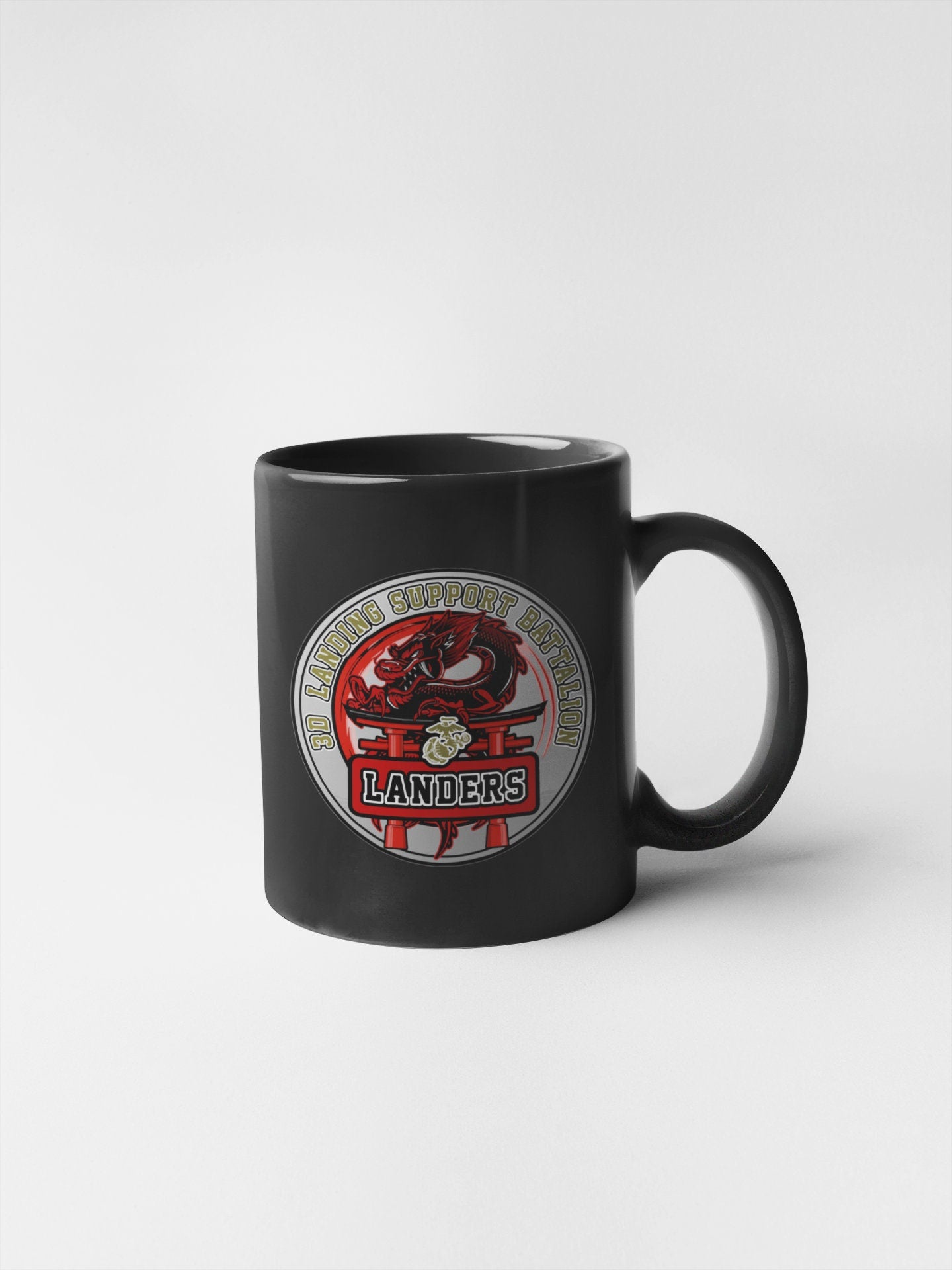 a black coffee mug with a logo on it
