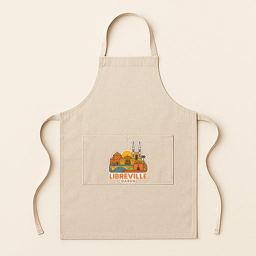 A beige apricot with a graphic of a city skyline and the text "LIBREVILLE" printed on it.