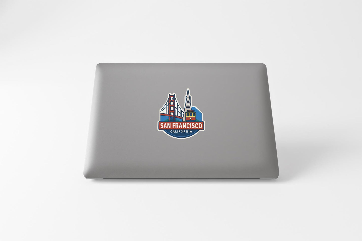 a laptop computer sitting on top of a white table