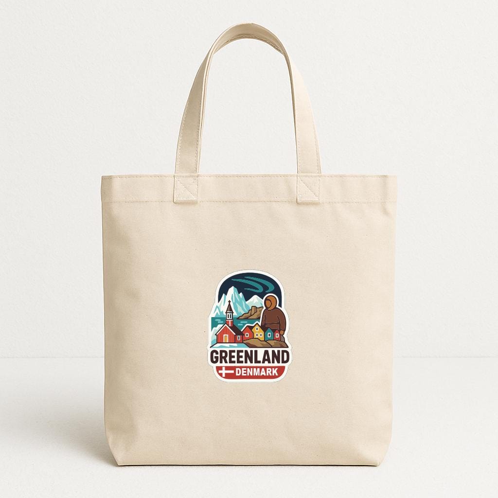A beige tote bag with a graphic design depicting a scenic landscape and the text "GREENLAND DENMARK" printed on it.