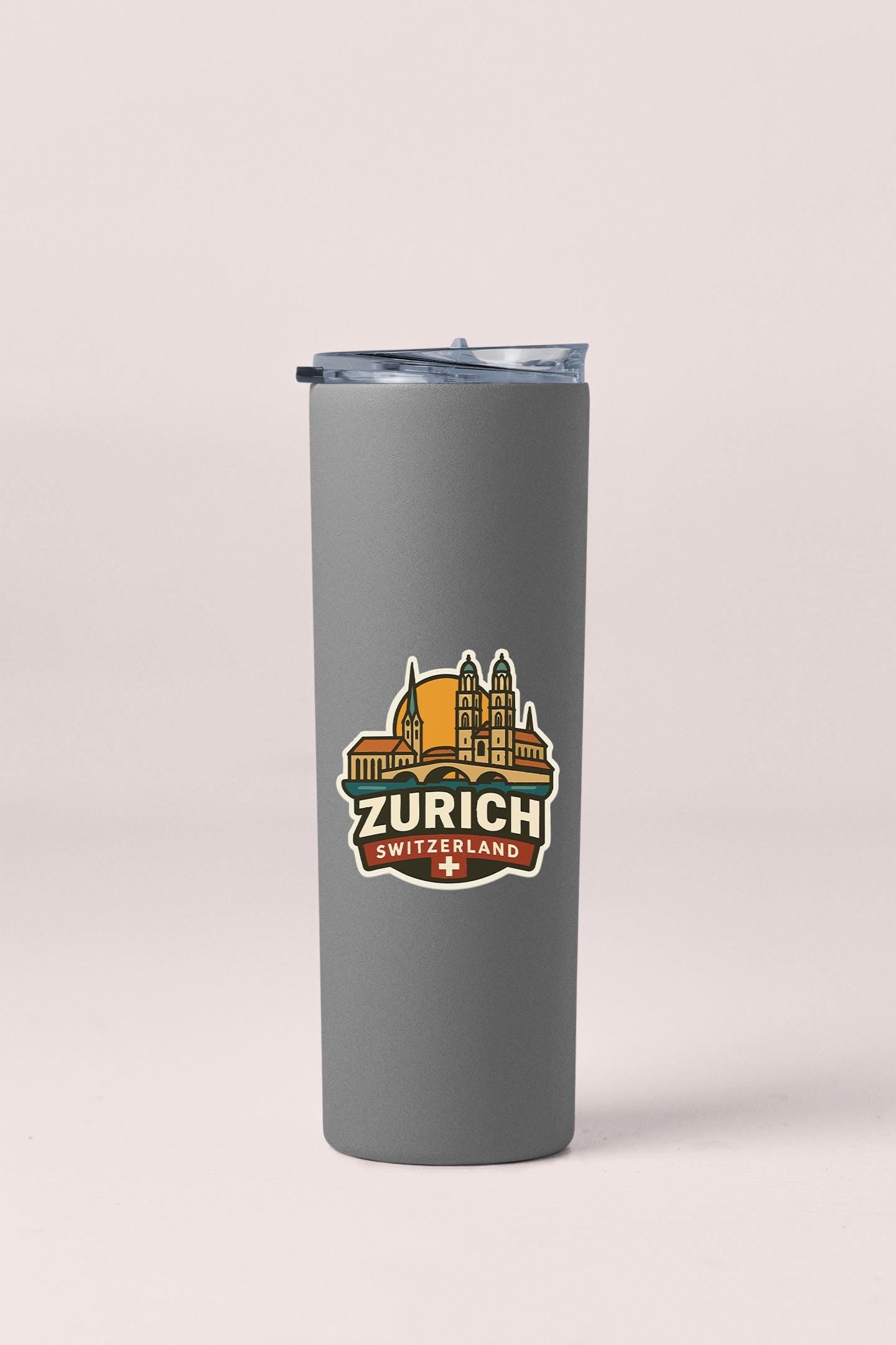 a travel mug with a picture of a city on it