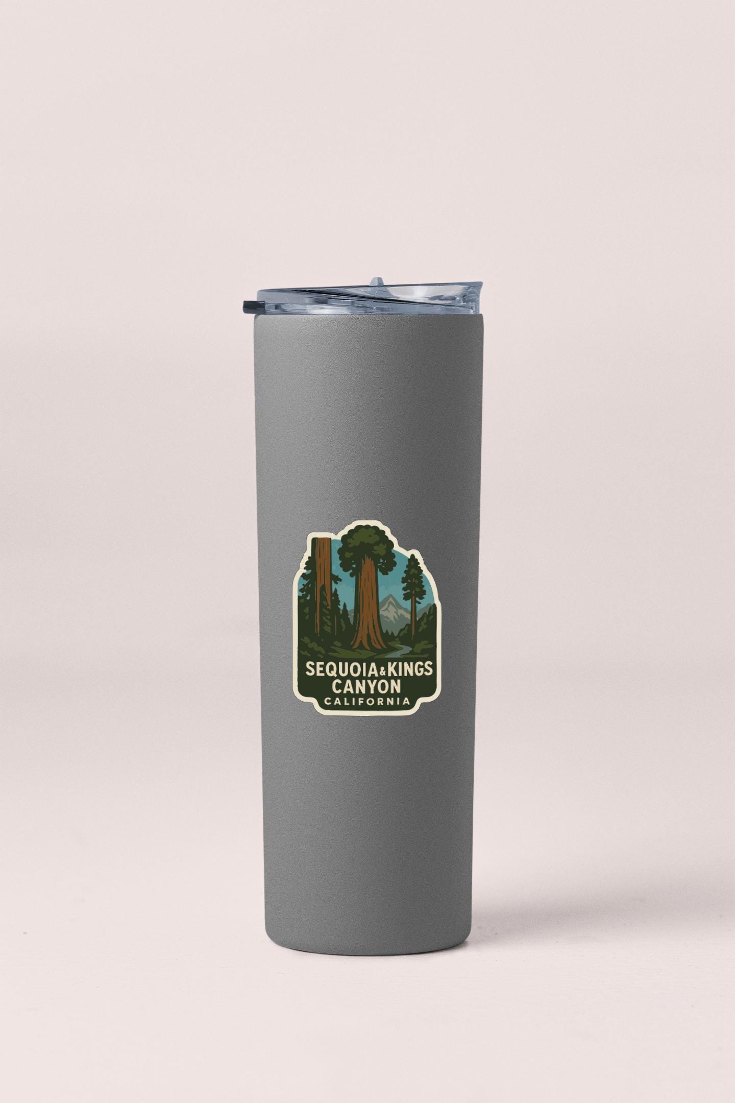A gray insulated tumbler with a lid and a label that says "SEQUOIAKINGS CAVALOON, CALIFORNIA".