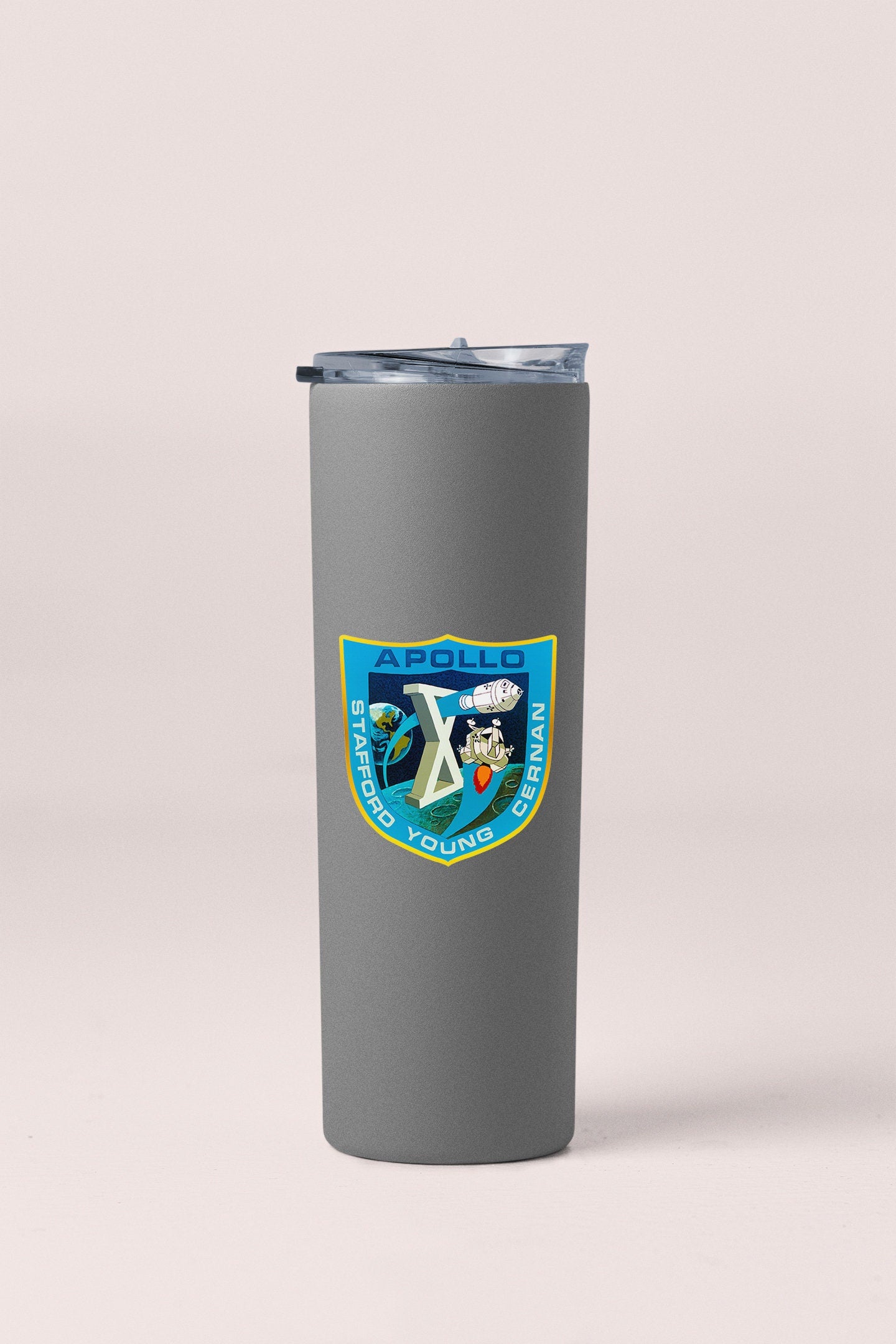 a stainless steel tumbler with a picture of a surfer on it