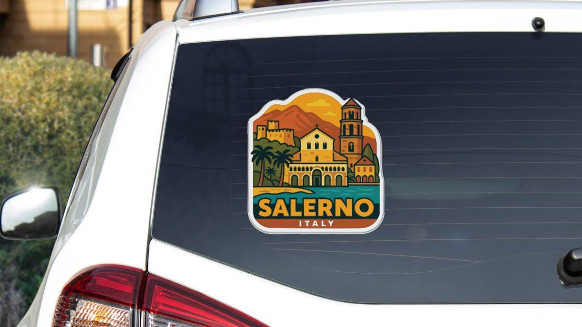 A sticker on the rear window of a car that says "SALERNO ITALY".