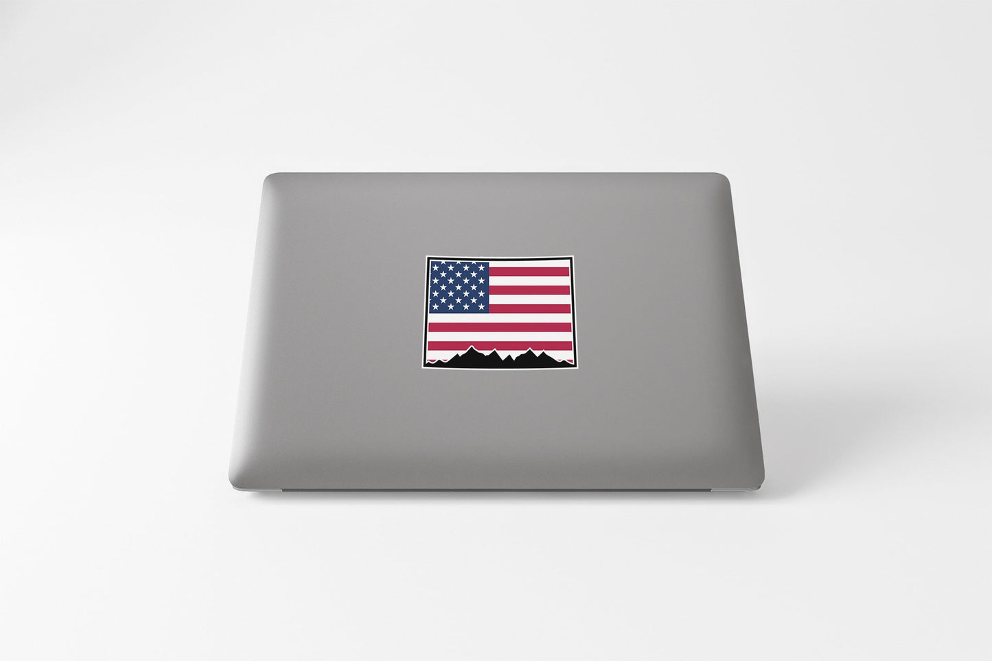 a laptop with a sticker of the state of arizona