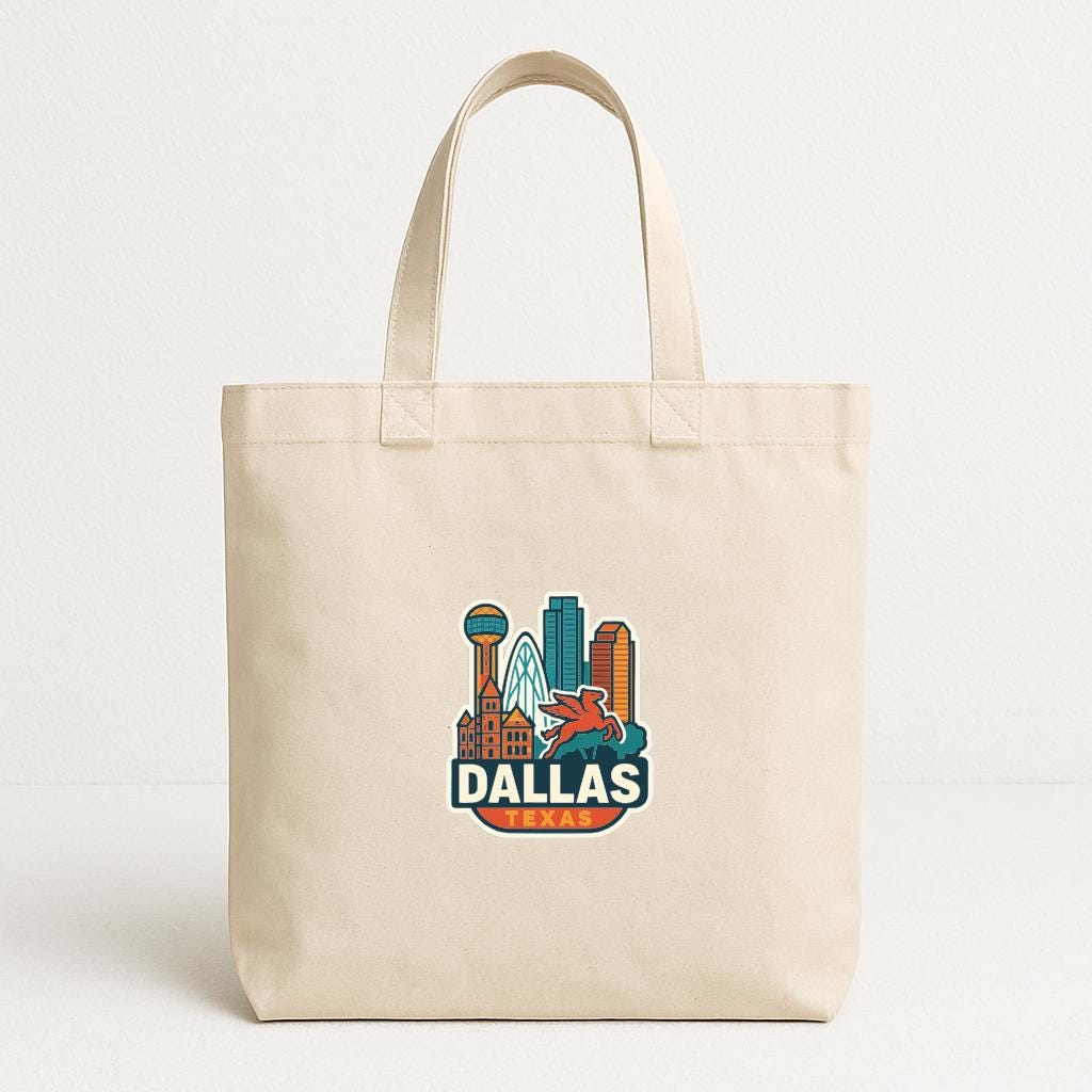 A beige tote bag with a printed design of the Dallas, Texas skyline.