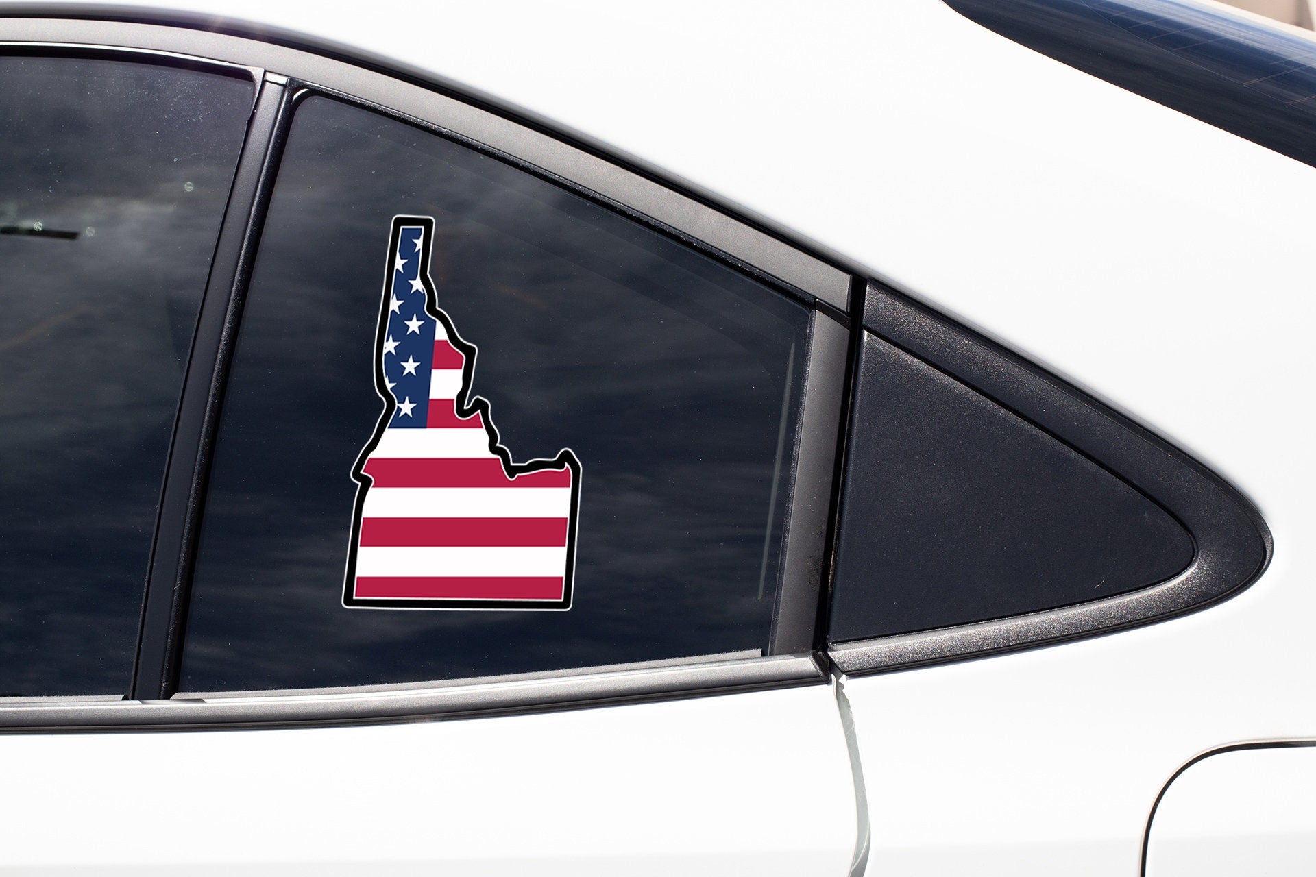 a car with a sticker of the state of michigan on it