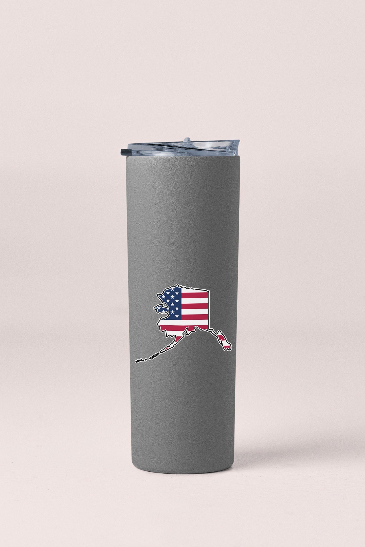 a gray tumbler cup with the american flag on it