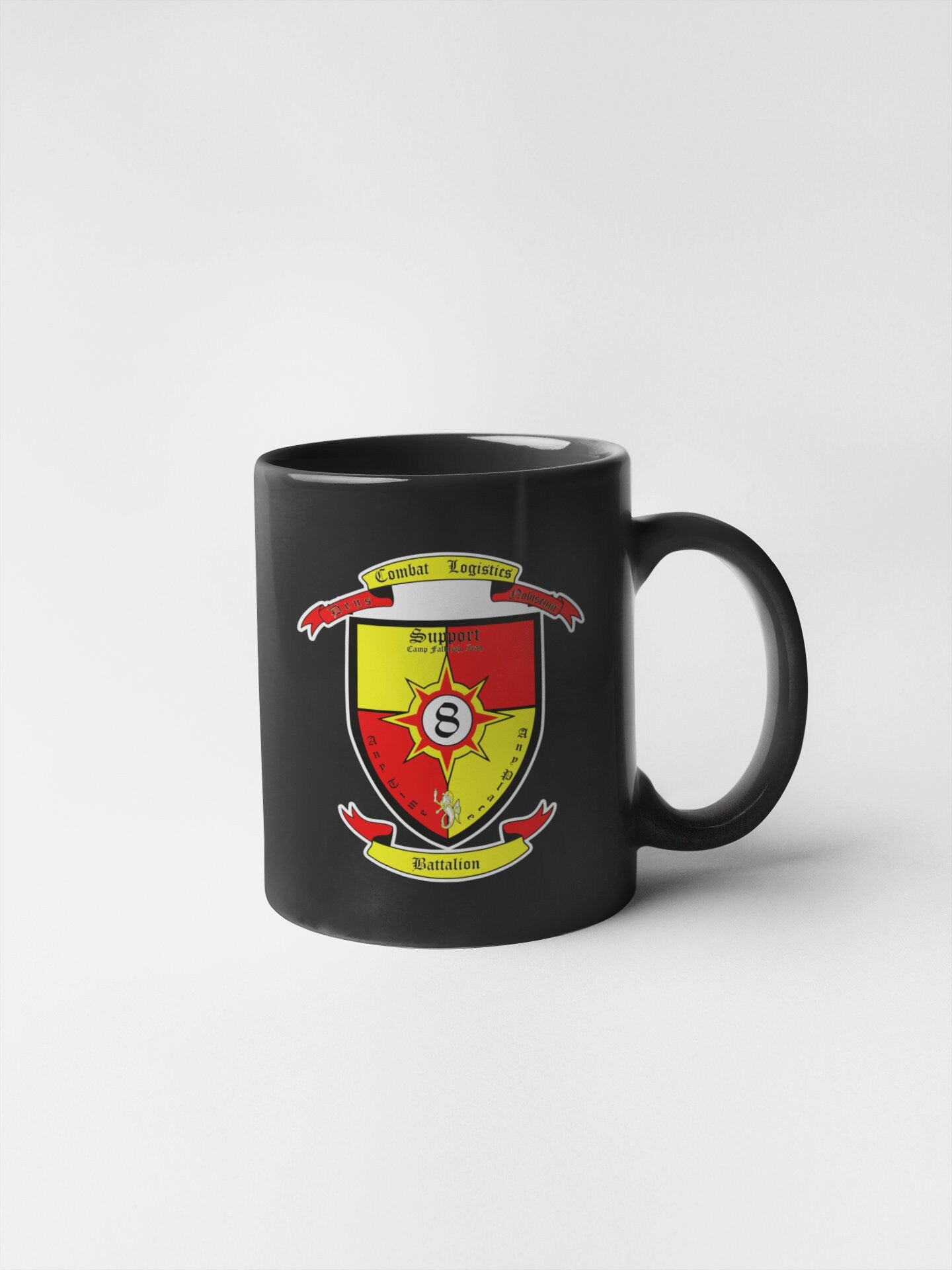 a black coffee mug with a coat of arms on it