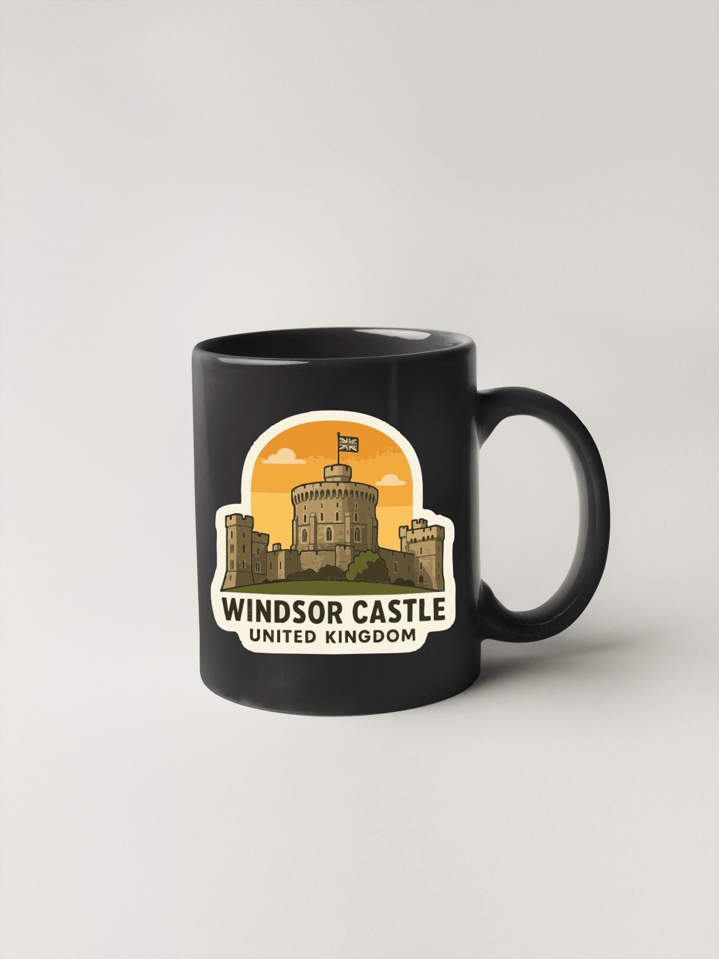 A black coffee mug with a graphic of Windsor Castle, the United Kingdom, printed on it.