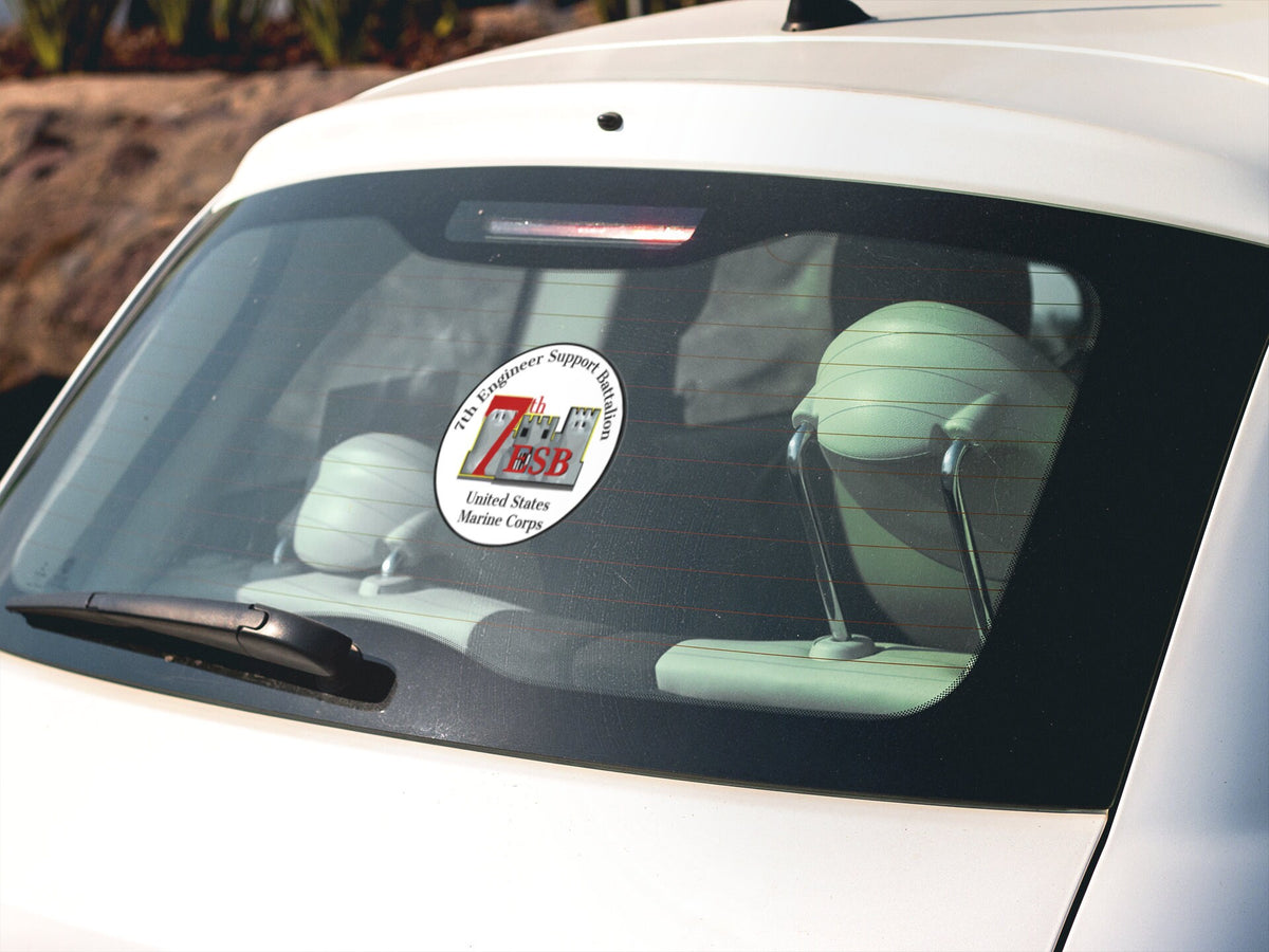 a white car with a sticker on it