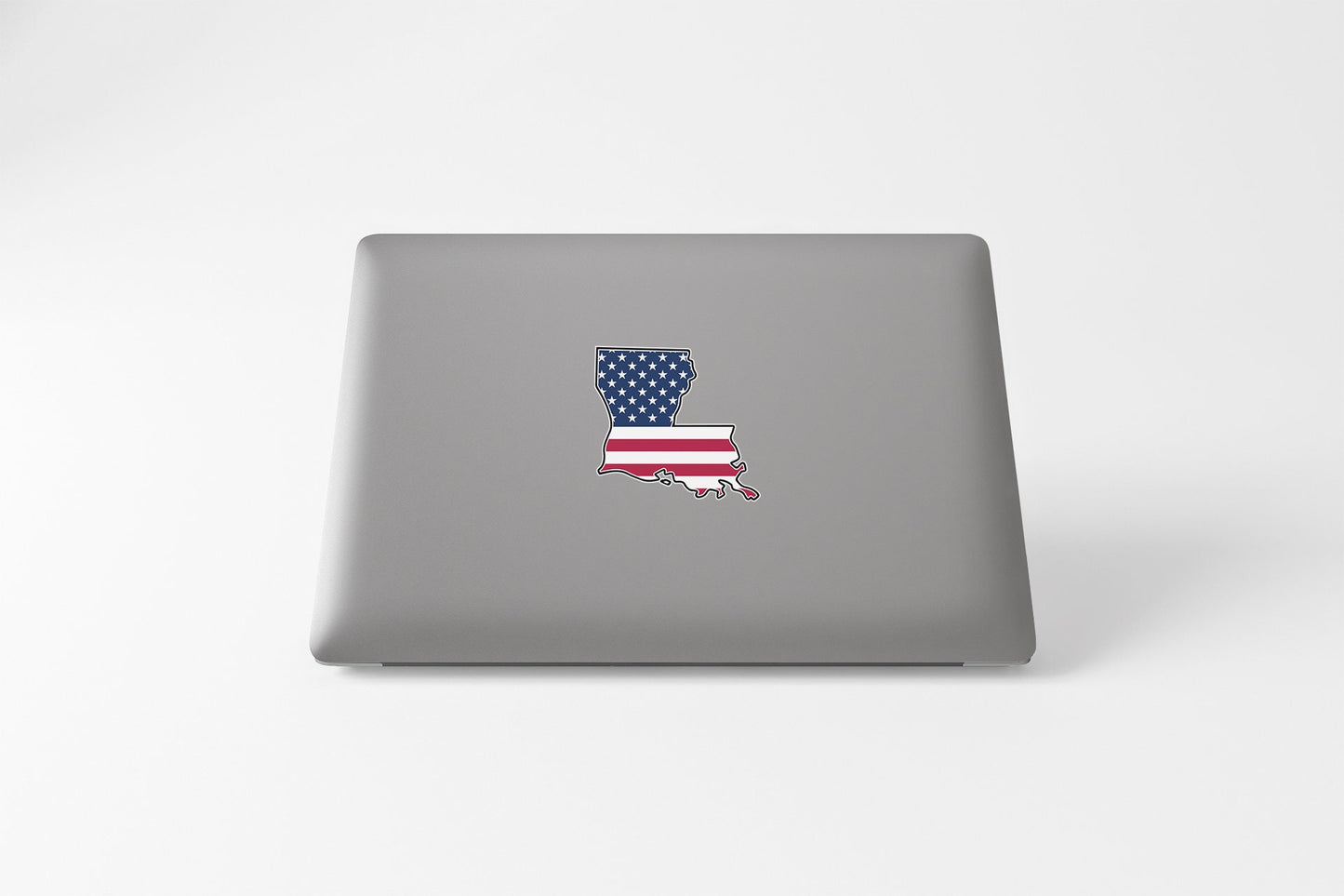 a laptop with a sticker of the state of texas