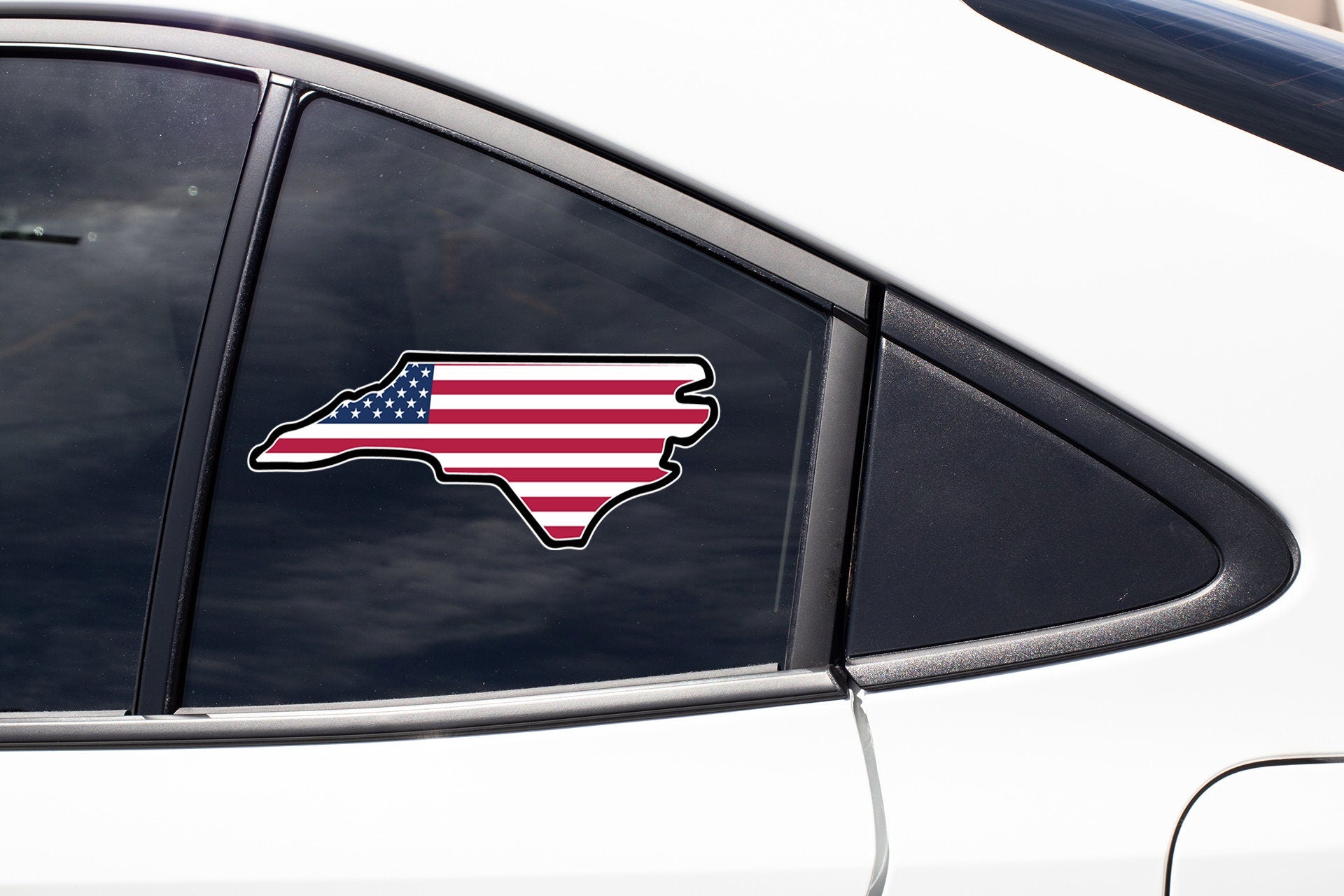 a sticker of the state of texas on the side of a car