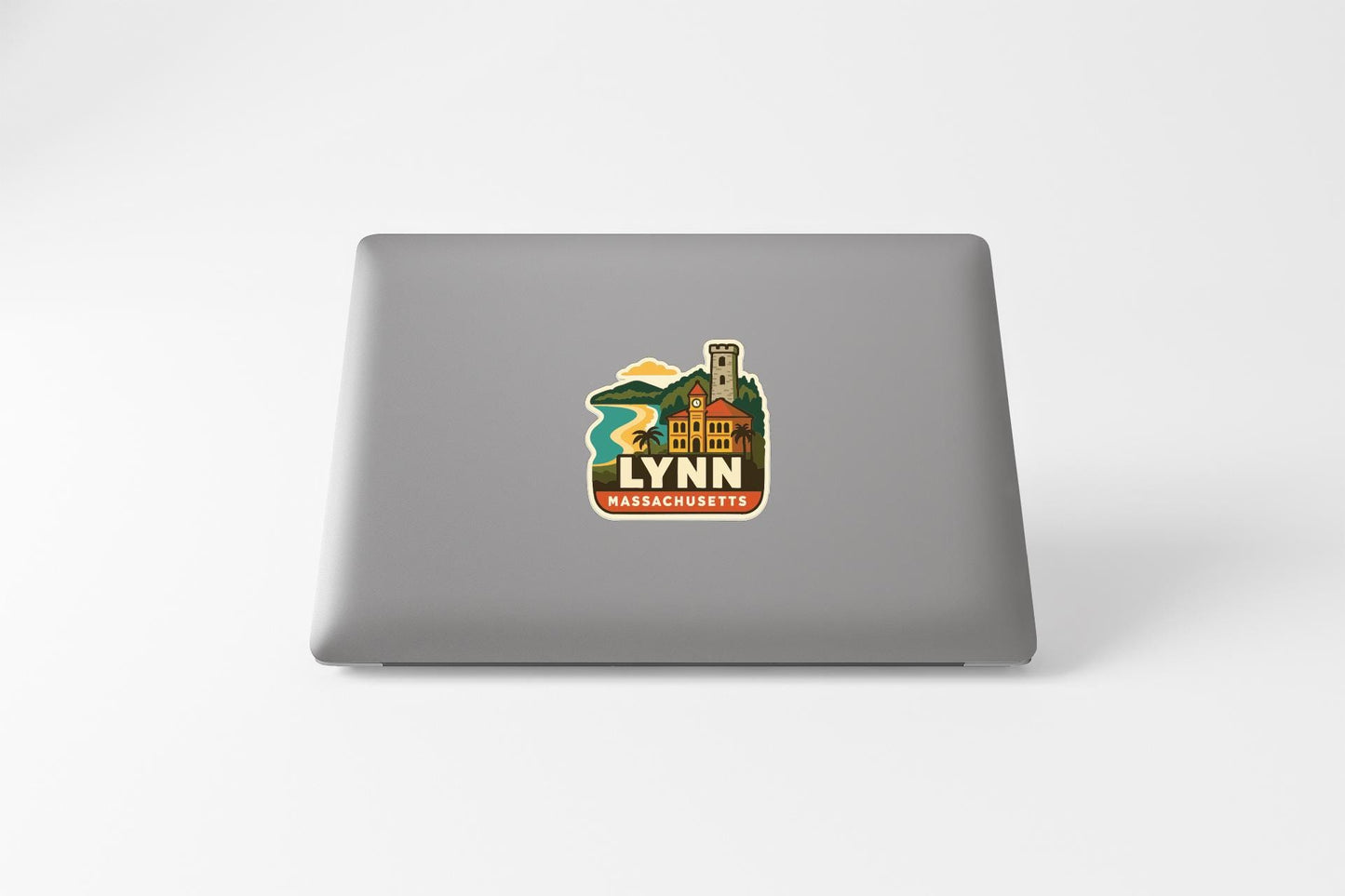 A sticker on the back of a laptop, depicting a scenic view of Lynn, Massachusetts.