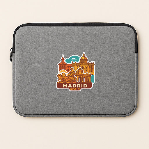 A gray laptop sleeve with a graphic design depicting the city of Madrid, Spain.
