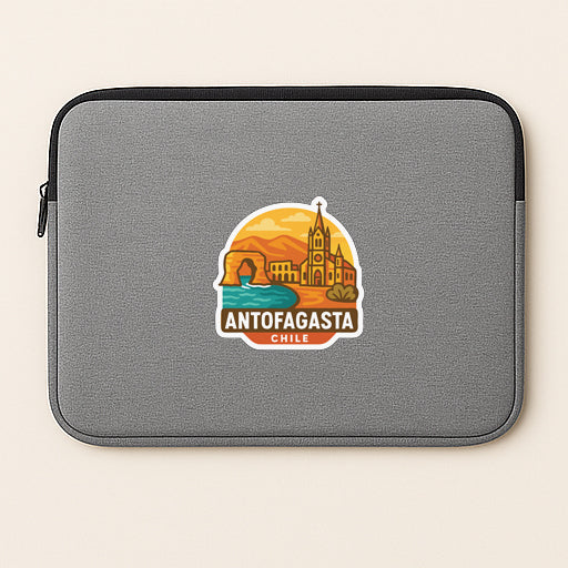 a gray laptop sleeve with a sticker depicting the city of Antofagasta, Chile.