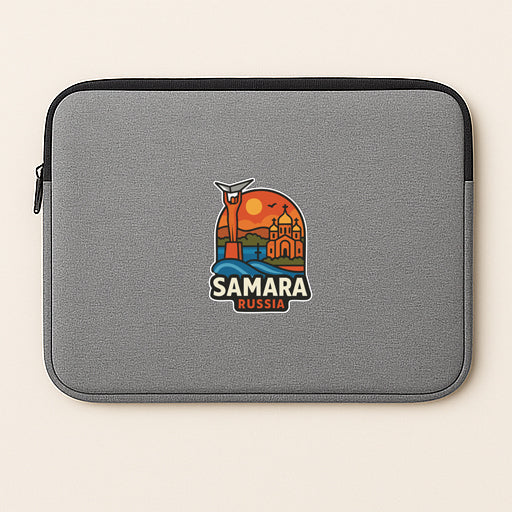 a gray laptop sleeve with a colorful sticker depicting a cityscape and the text "SAMARA RUSSIA".