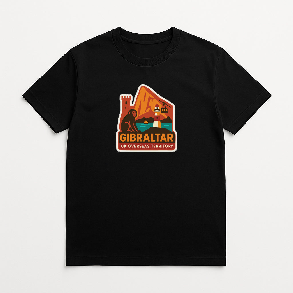 A black t-shirt with a graphic design featuring a castle, lighthouse, and mountains, along with the text "GIBRALTAR UK OVERSEAS TERRITORY".