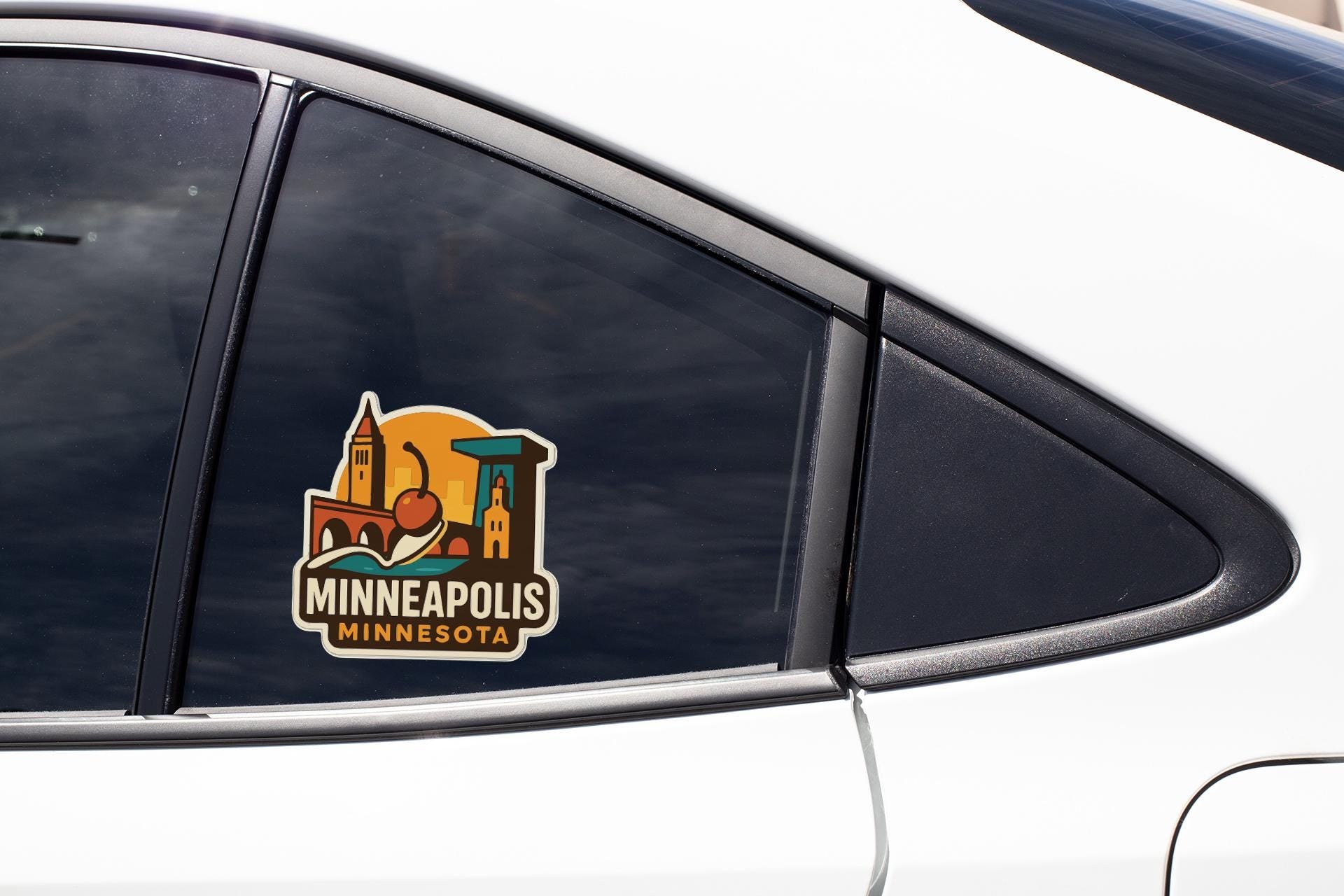 A sticker on the side of a car window that says "MINNEAPOLIS MINNESOTA".