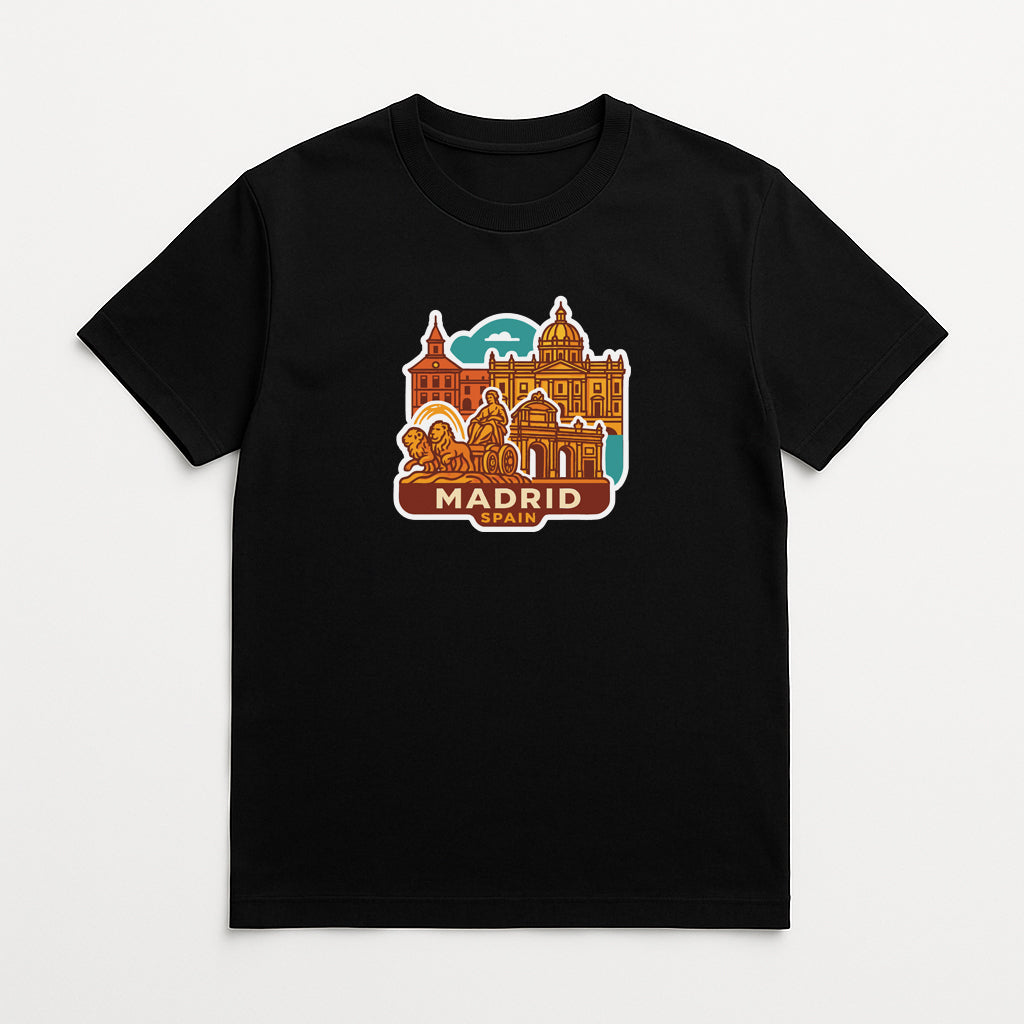 A black t-shirt with a colorful graphic design depicting the city of Madrid, including its iconic landmarks and architecture.