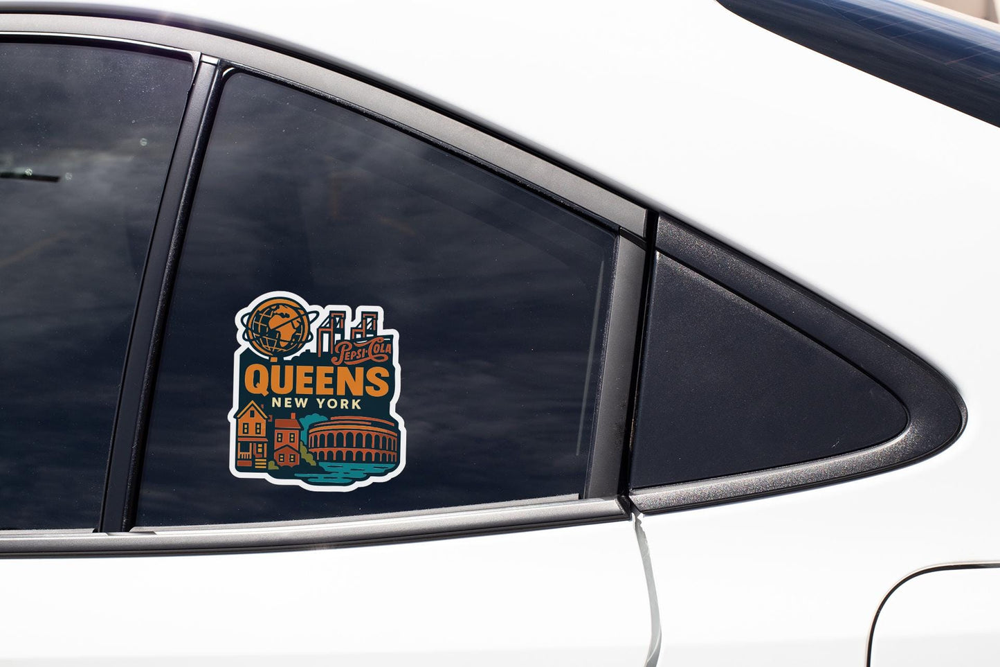 A sticker on the side of a car window, featuring an illustration of a city skyline and the text "Queens New York".