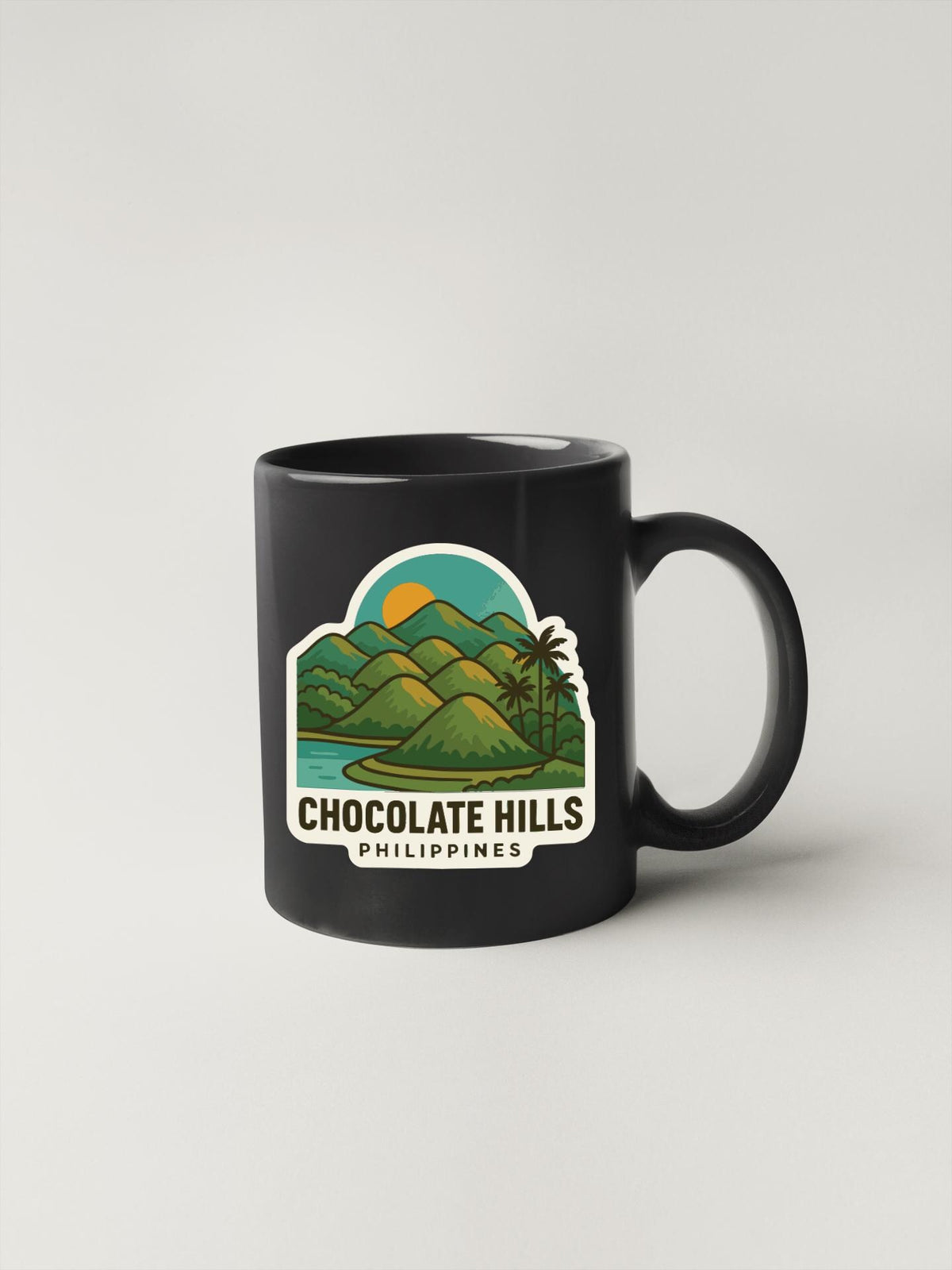 A black coffee mug with a graphic design depicting a tropical landscape with mountains, palm trees, and a body of water.