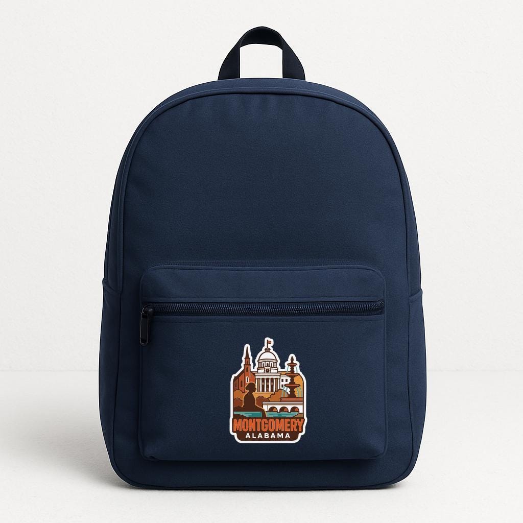 A navy blue backpack with a graphic of the Montgomery, Alabama state capitol on the front.
