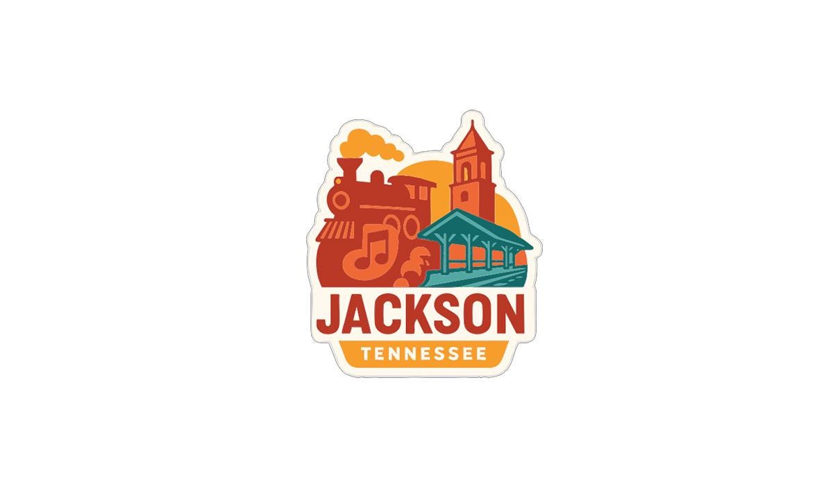 A colorful sticker or logo depicting a train, a building, and the text "JACKSON TENNESSEE" in a stylized design.