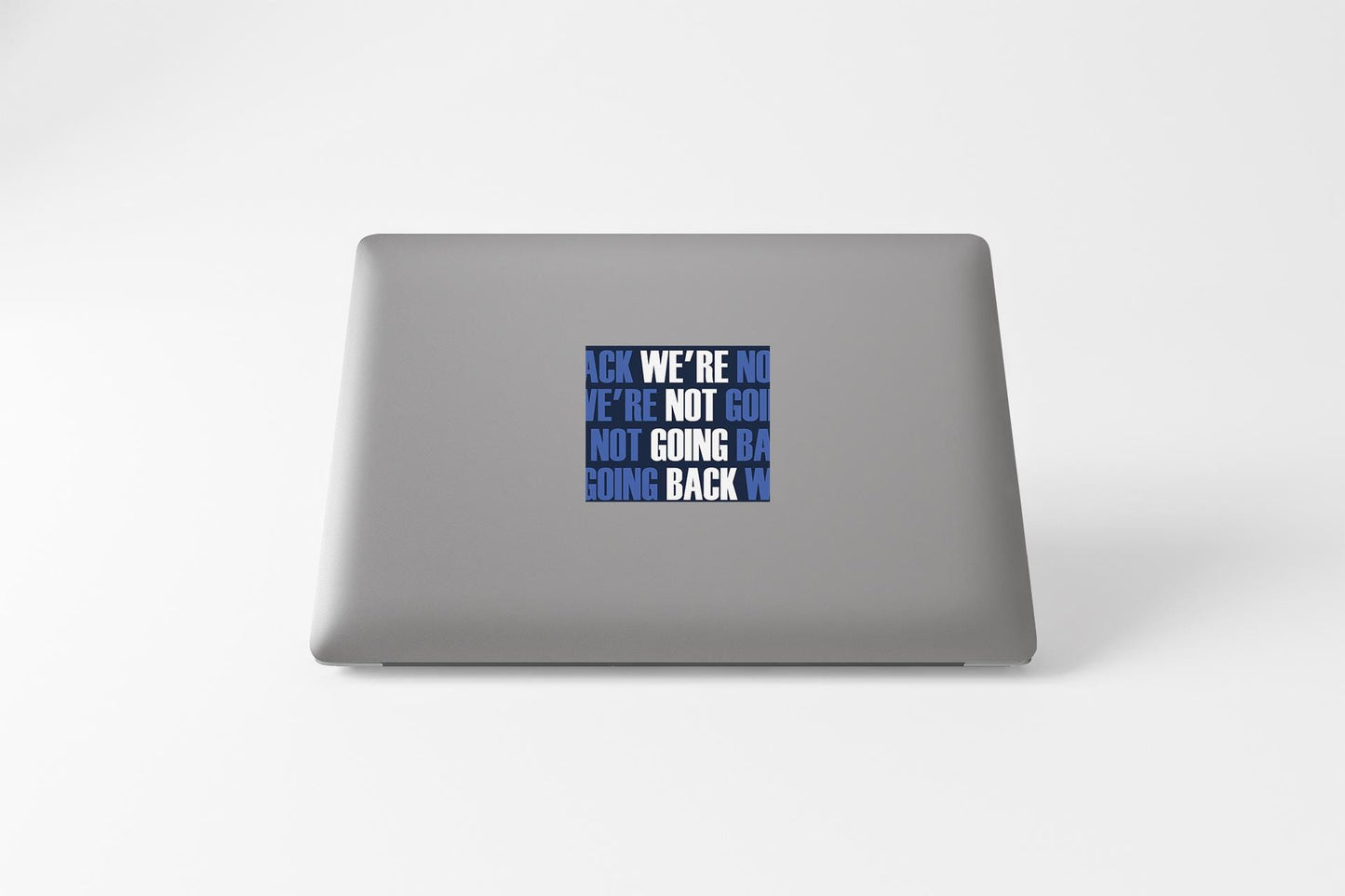 a laptop computer with a sticker on it