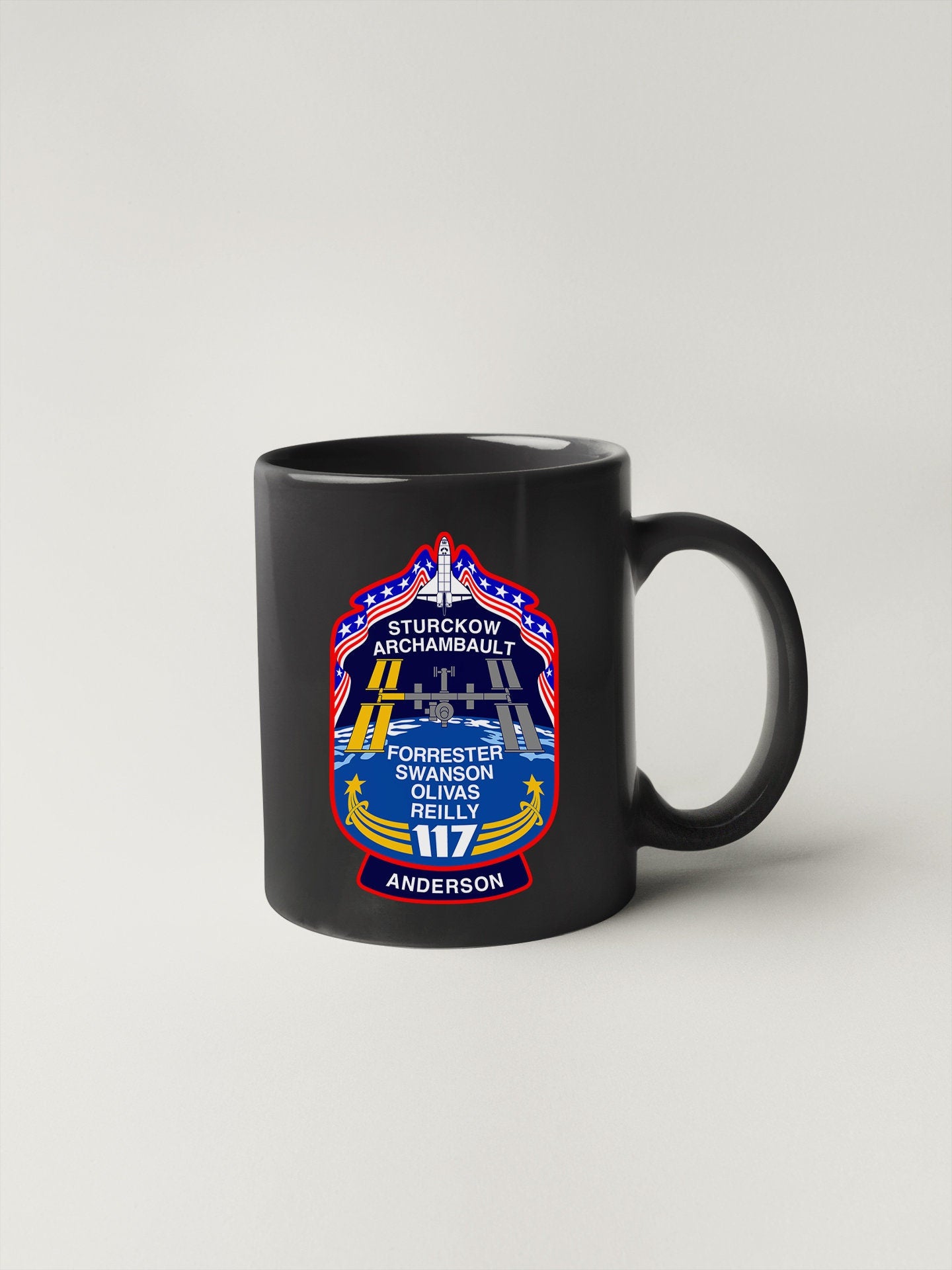 a black coffee mug with a logo on it