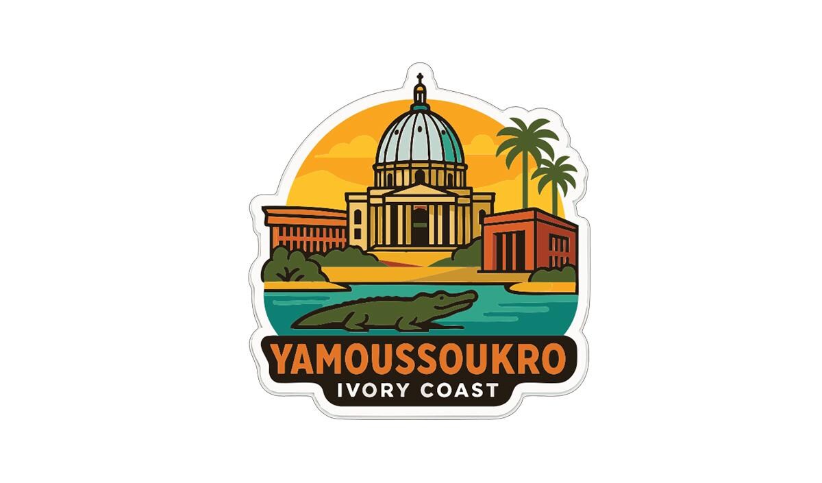 a sticker or emblem with a stylized illustration of a building, palm trees, and a crocodile, along with the text "YAMOUSSOUKRO IVORY COAST".