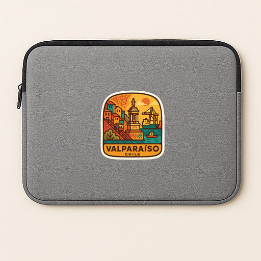 A gray laptop sleeve with a sticker depicting a cityscape and the text "VALPARAISO CHILE".