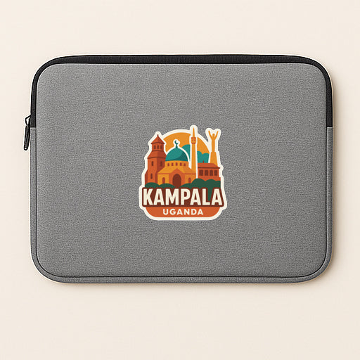 A gray laptop sleeve with a sticker depicting the city of Kampala, Uganda.