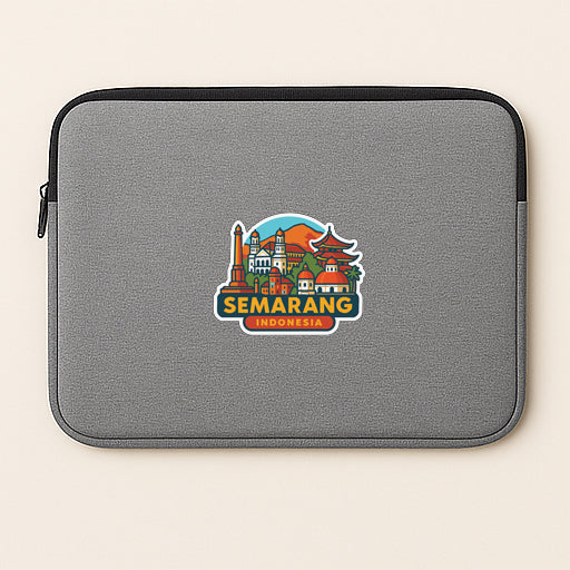 a gray laptop sleeve with a colorful sticker depicting the city of Semarang, Indonesia.