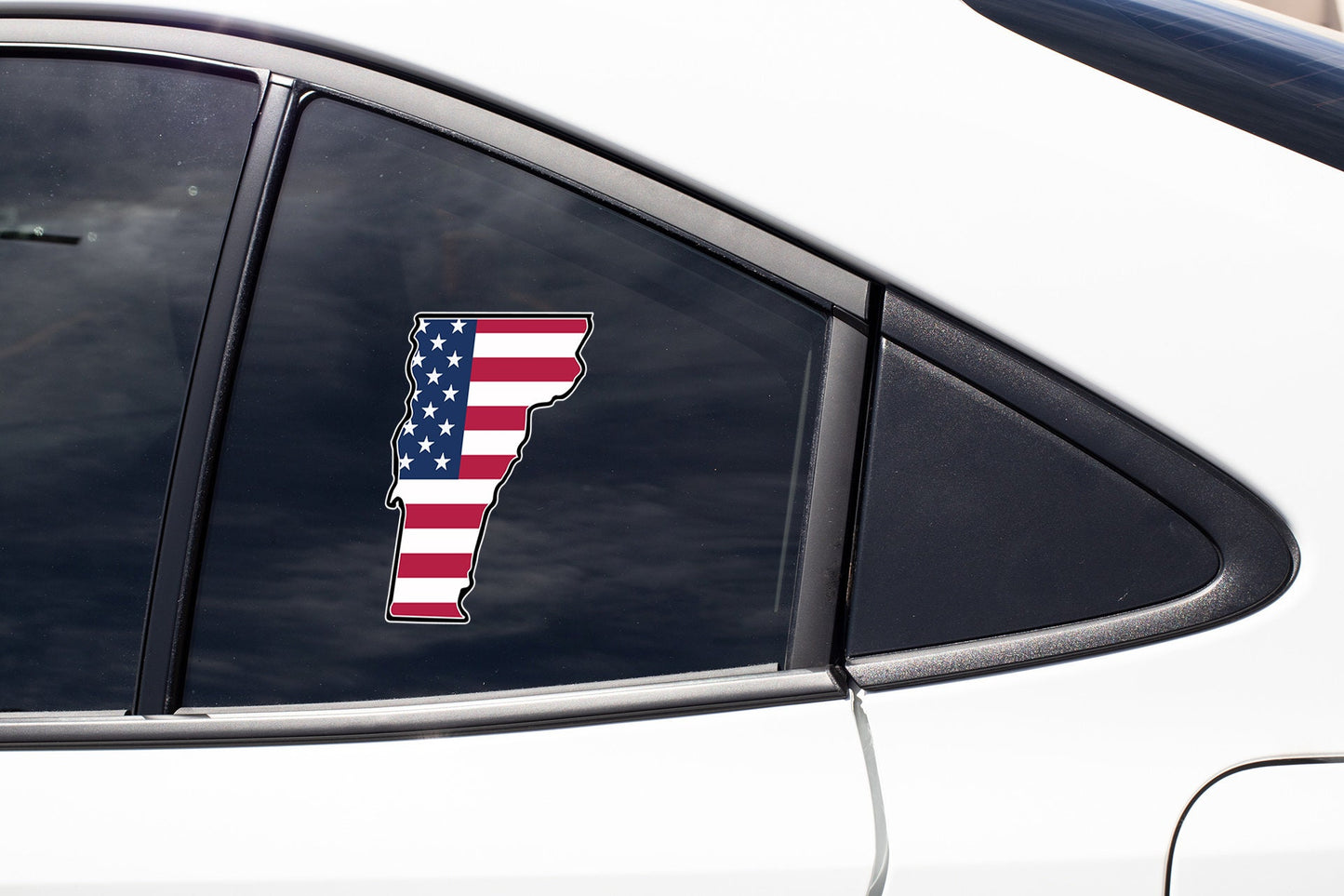 an american flag sticker on the side of a car