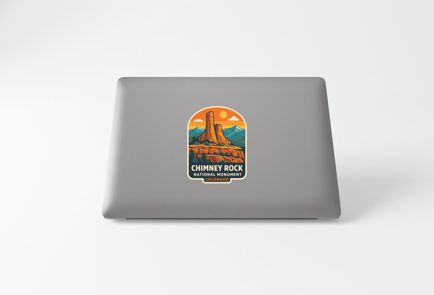 a sticker or decal of the Chimney Rock National Monument on a laptop computer.