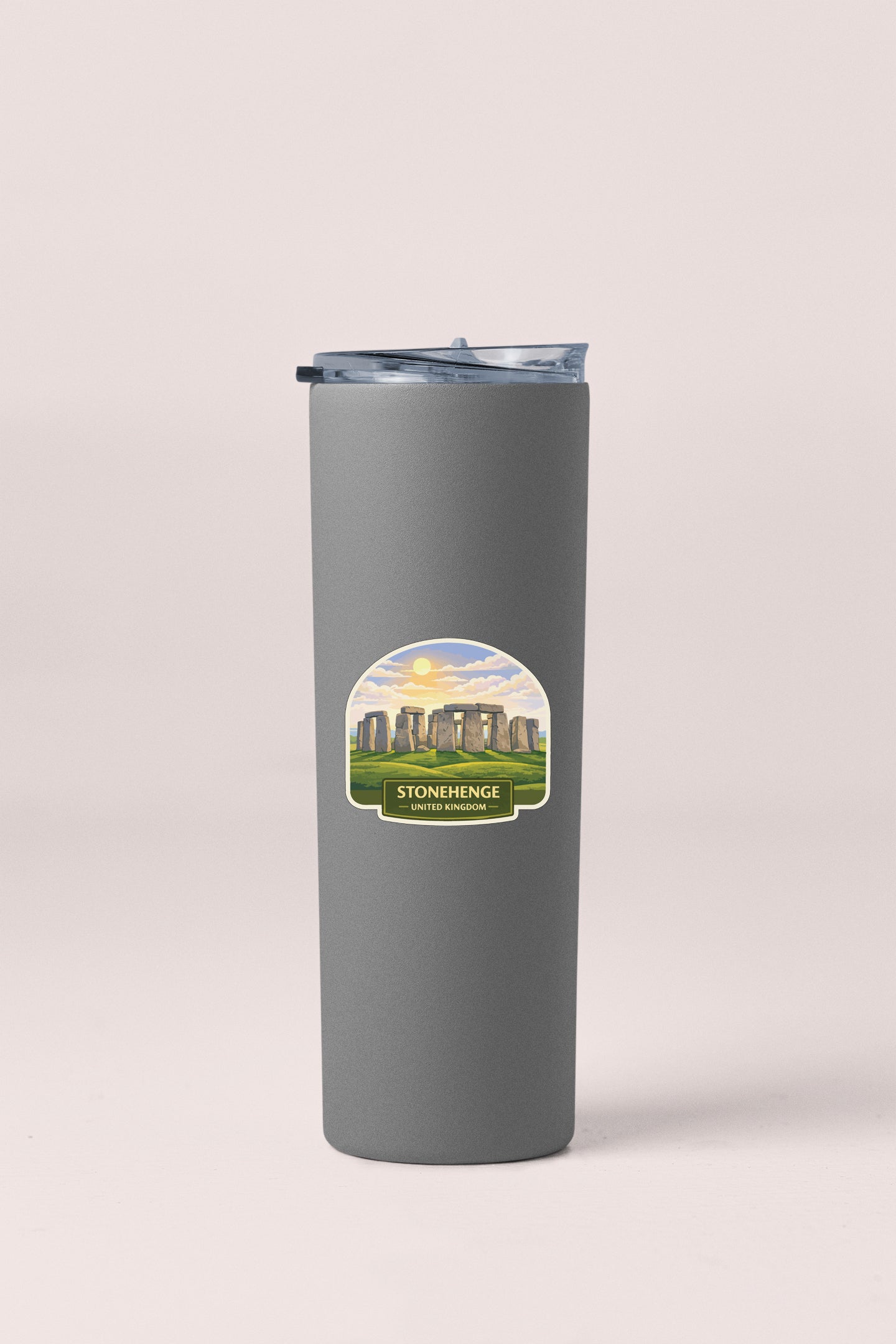 A gray cylindrical container with a lid and a label that says "STONHENGE" and "UNITED KINGDOM".