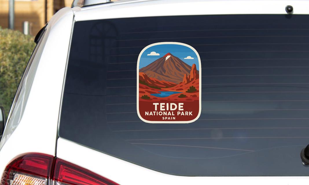 A sticker on the rear window of a car that says "Teide National Park, Spain".