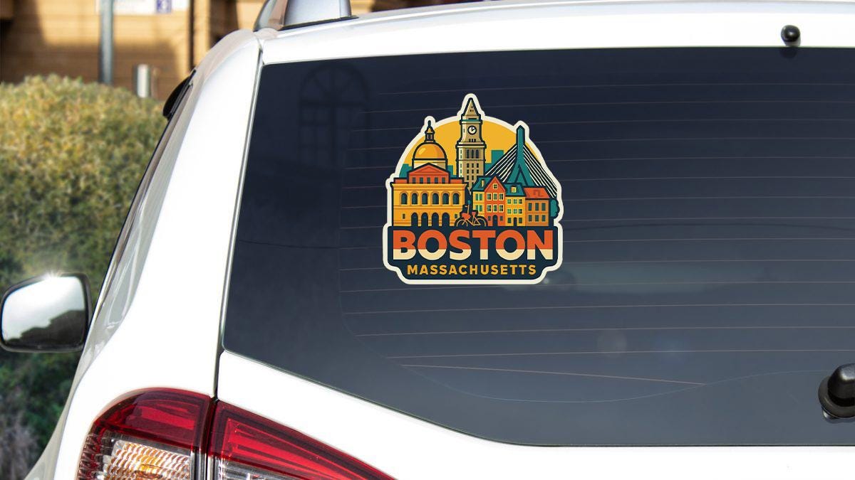a sticker on the back of a white car