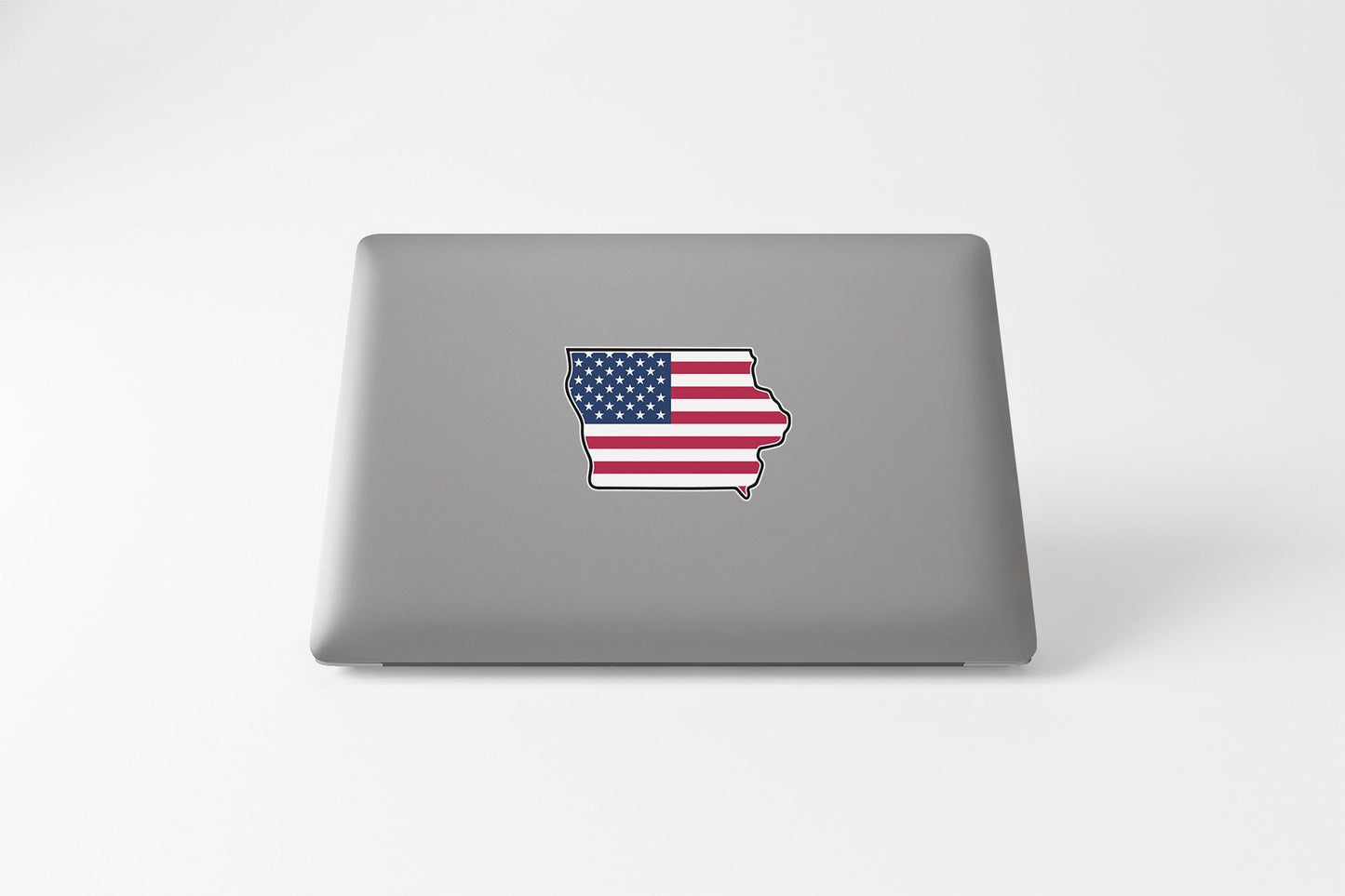 a laptop with a sticker of the state of indiana
