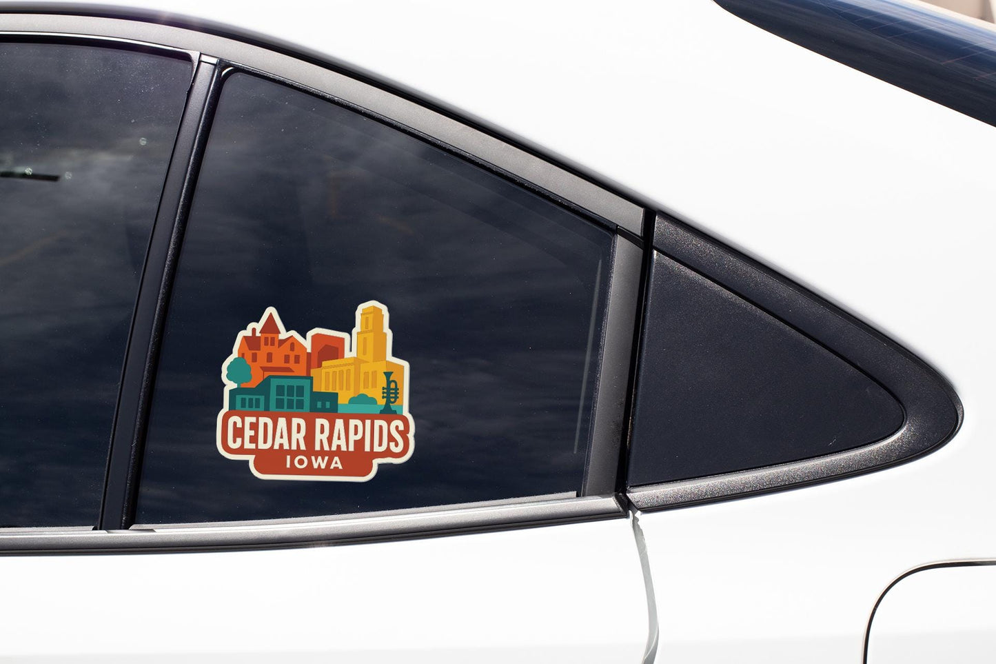 A car window sticker on a vehicle, displaying the text "Cedar Rapids, Iowa".