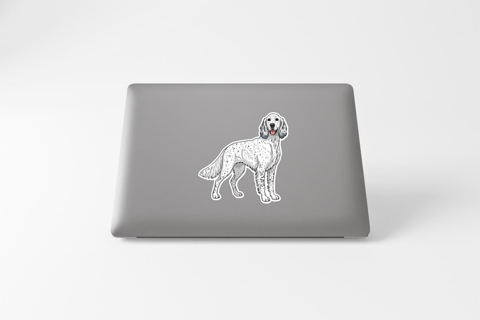 A sticker of a dog on the back of a laptop computer.