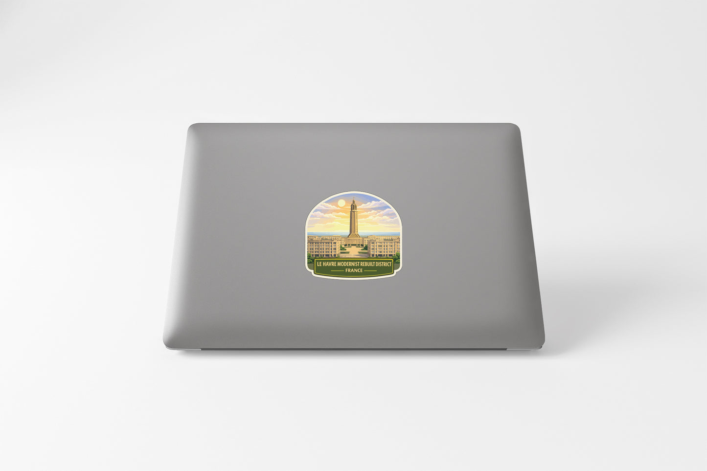 A sticker depicting the Washington Monument on a laptop.