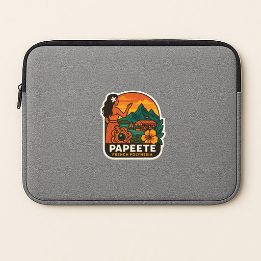 A gray laptop sleeve with a colorful sticker depicting a hula girl and tropical scenery.